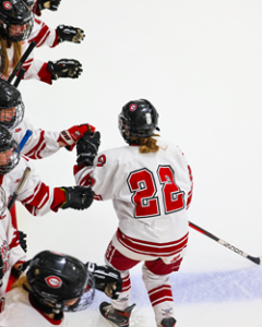 team fist bumps after goal